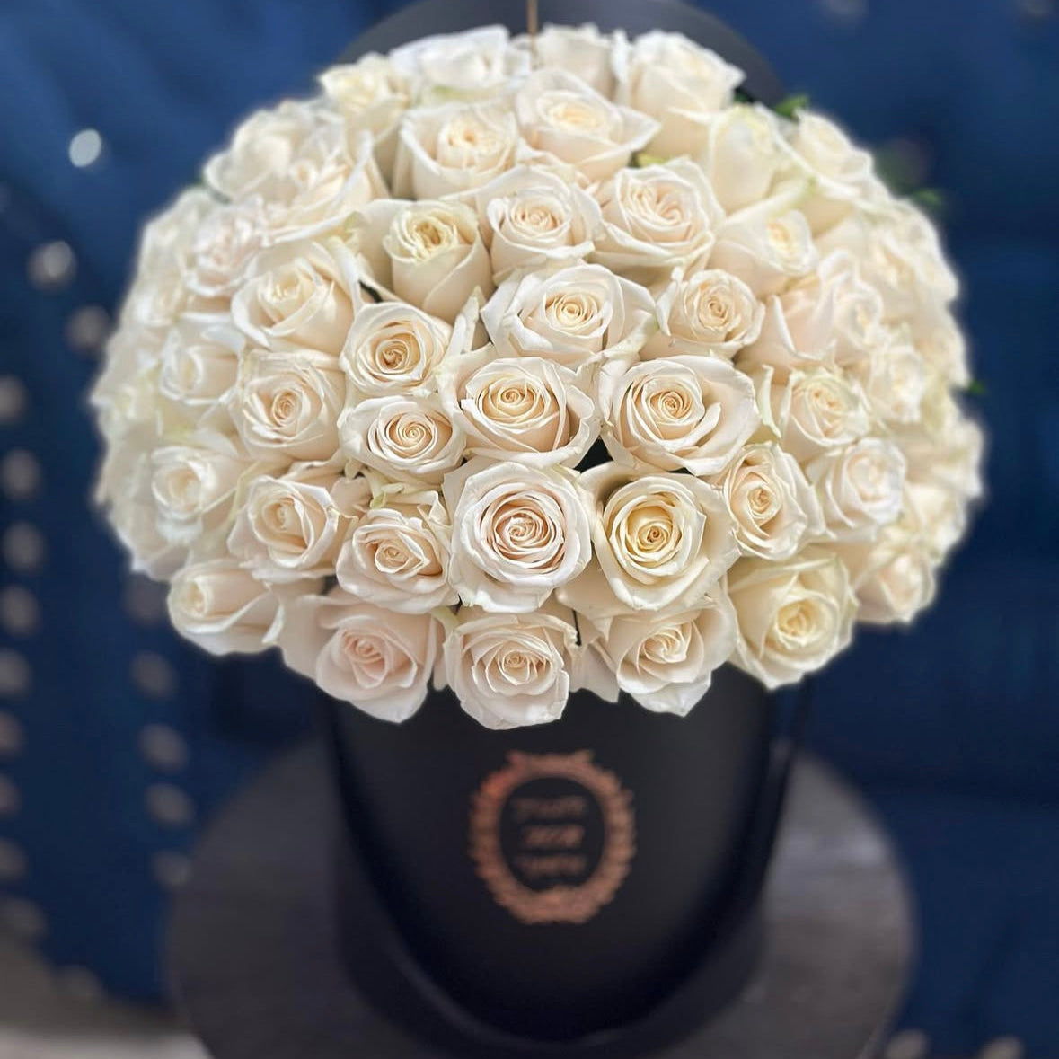 Roses arranged in a round box