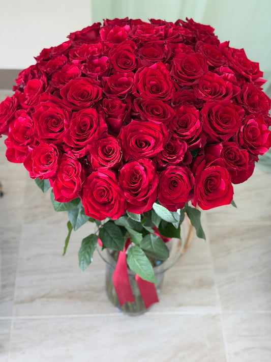 50 roses in a vase