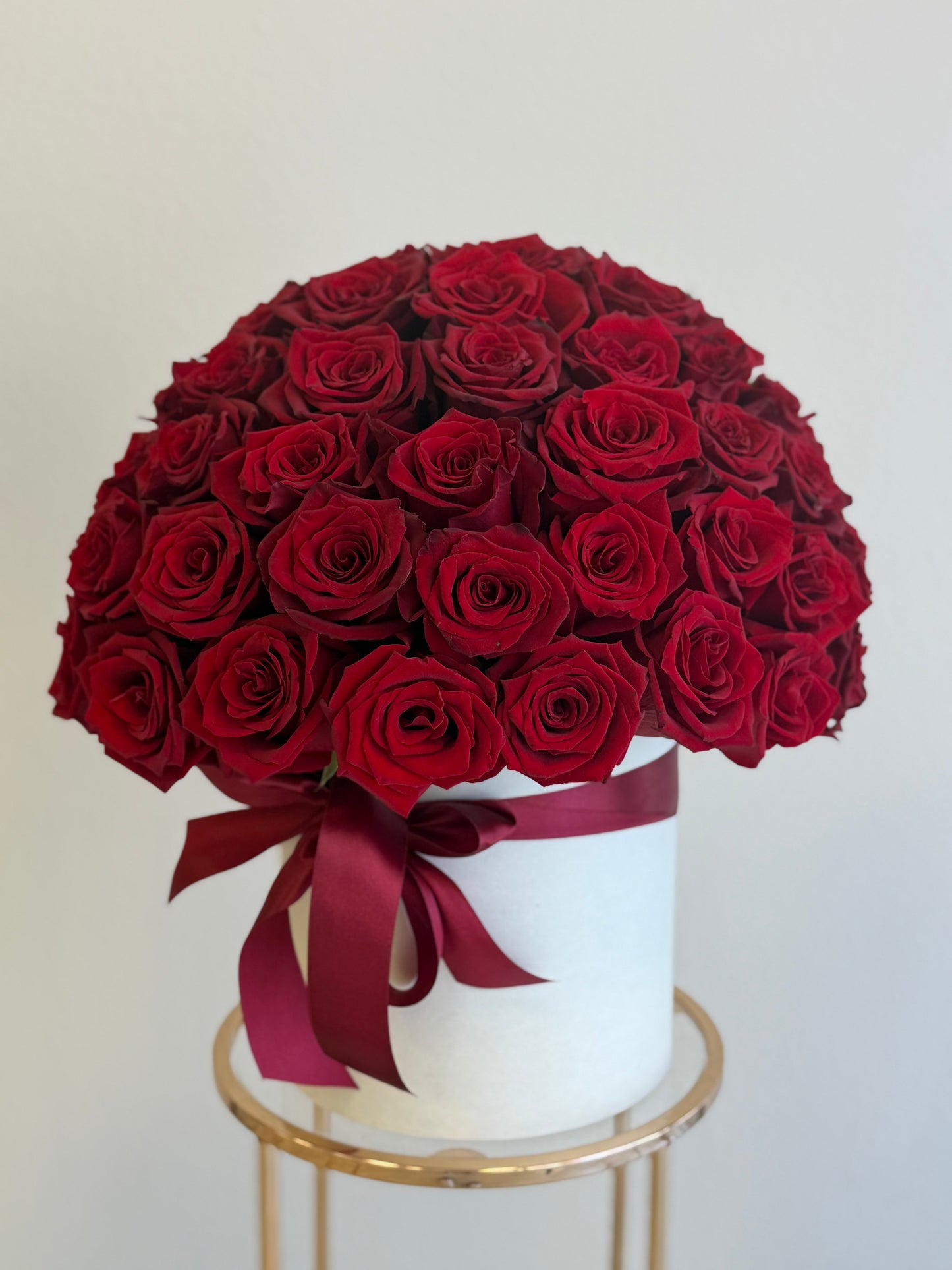Roses arranged in a round box