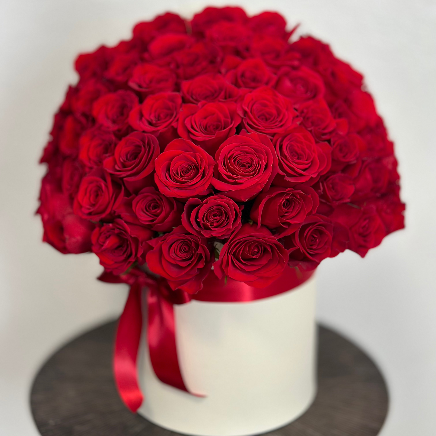 Roses arranged in a round box