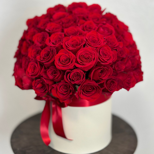 Roses arranged in a round box