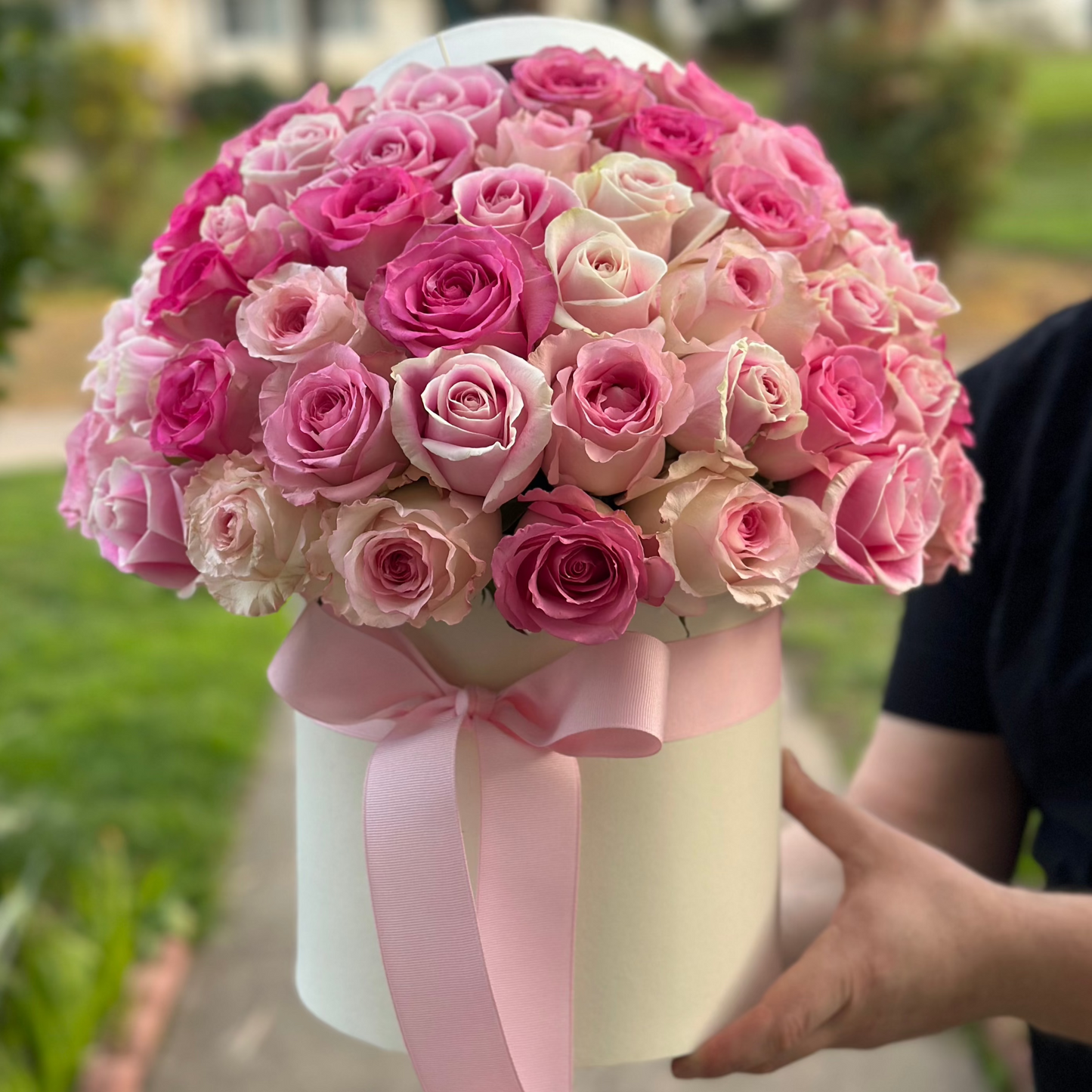 Roses arranged in a round box